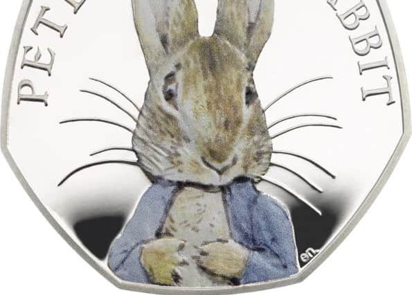 A coloured Peter Rabbit  coin will mark 150 years since the author's birth.