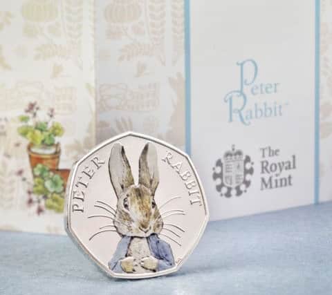 A coloured Peter Rabbit  coin will mark 150 years since the author's birth.