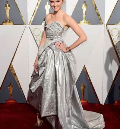 Lily Cole, resplendent in Vivienne Westwood, arrived at this week's Oscars. Ian West/PA Wire