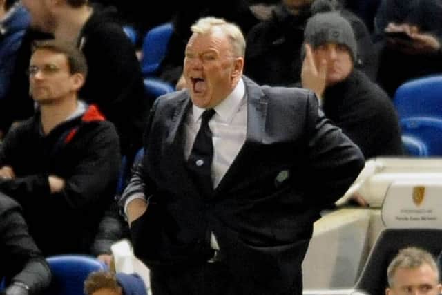 Dejected Steve Evans at Brighton