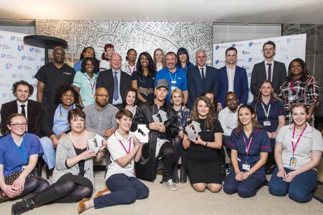 Justin Bieber meets the NHS Choir including Dr Katie Rogerson (front row, centre right). Picture by Carsten Windhorst/ FRPAP.com.