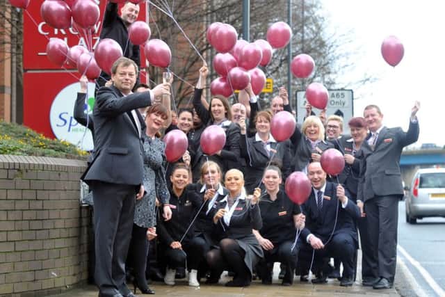 General manager Marco Frik and staff celebrate the reopening of the Crowne Plaza. Picture by Tony Johnson.