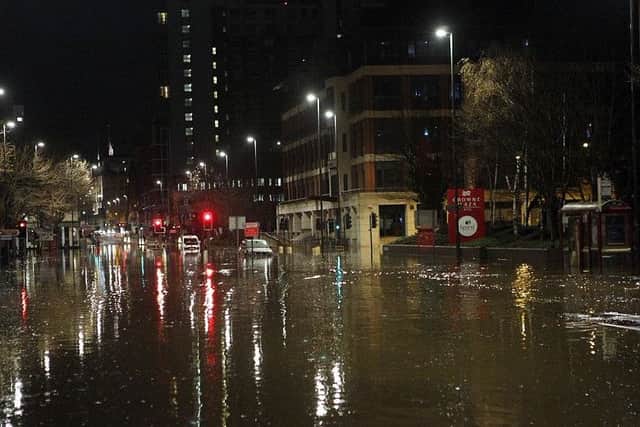 The flood water outside the Crowne Plaza, in Wellington Street, Leeds.