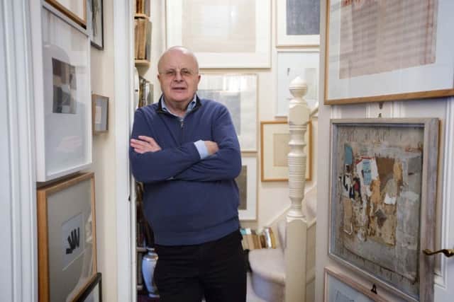 London-based art collector Tim Sayer, with some of his collection.