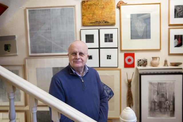 London-based art collector Tim Sayer, with some of his collection.