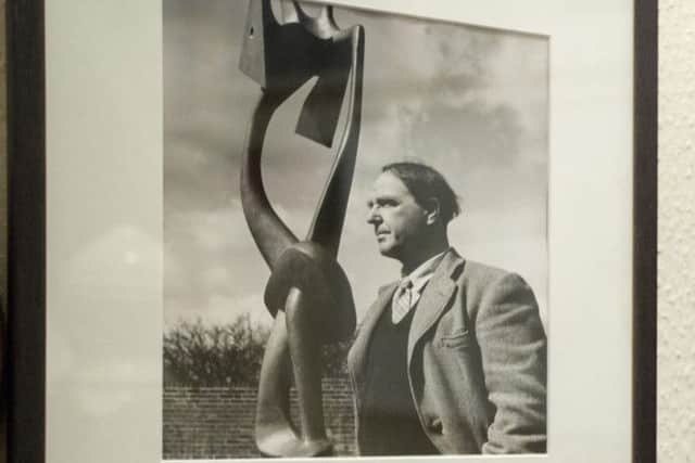 London-based art collector Tim Sayer, with some of his collection.