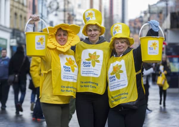 Marie Curie volunteers Kirsty Walton, Jo Bicknell, and Lynne Burrows on Briggate. PIC: James Hardisty