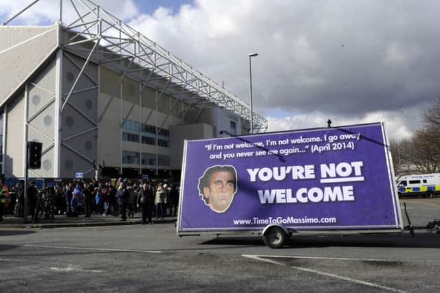 Fans protest outside the Elland Road stadium
