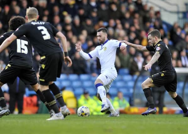 Mirco Antenucci battle through past Jay Spearing and the Bolton defence.