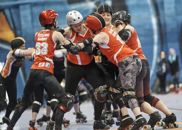 Leeds Roller Dolls Whip Its make tough work for Furness Firecrackers Flamin' Noras. Picture: Jason Ruffell, Roller Derby On Film