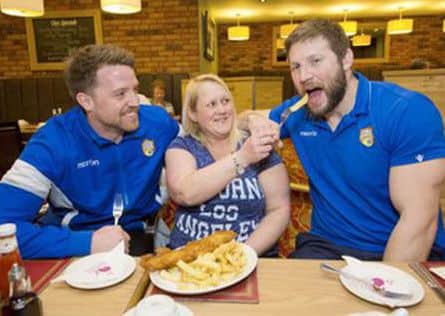 Wakefield Trinity Wildcats fan Catherine Wilkinson with Danny Kirmond and Nick Scruton.