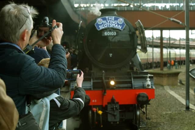 Steam enthusiasts taking photos of   the Flying Scotsman as it arrived in York last month. Picture: Gary Longbottom