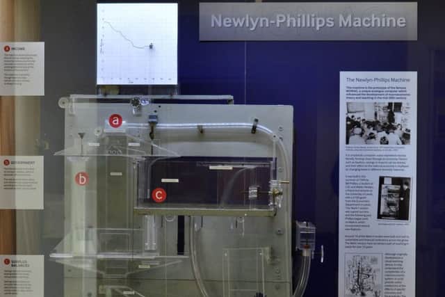 The Newlyn-Phillips machine uses water to simulate money flowing through the economy.