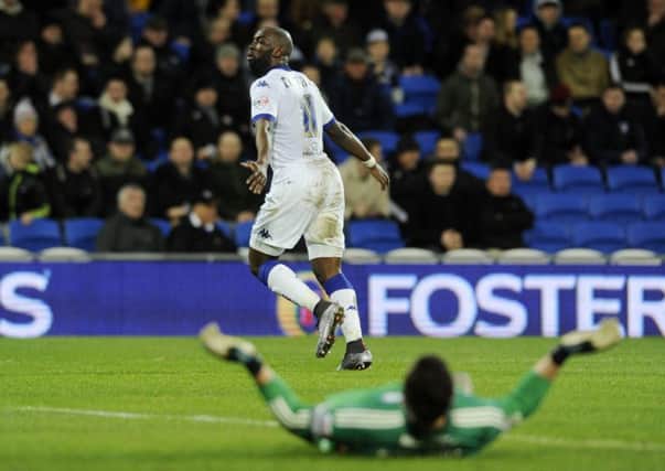 Souleymane Doukara turns to celebrate his opening goal for Leeds United against Cardiff City on Tuesday night.  Picture: Bruce Rollinson.