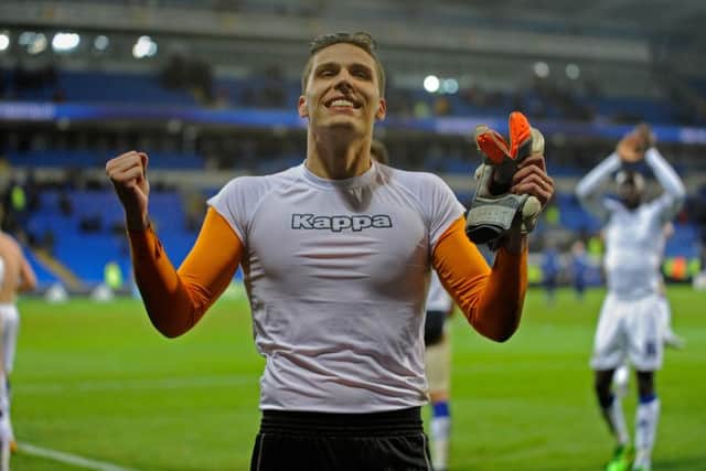 Marco Silvestri celebrates his clean sheet in front of the travelling Leeds fans.  Picture: Bruce Rollinson.