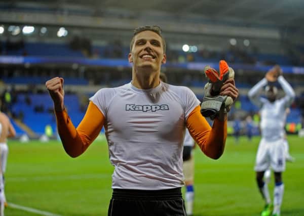 Marco Silvestri celebrates his clean sheet in front of the travelling Leeds fans.  Picture: Bruce Rollinson.