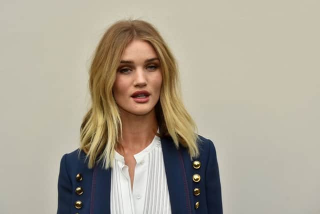 Rosie Huntington-Whiteley presents the perfect daytime face in nude and bronzed pink tones. To achieve the look, a foundation such as Smashbox CameraReady is ideal,  teamed with its Baked Fusion Soft Lights Bronzer on cheeks and eyes, and Be Legendary Lipgloss in Rich Rose.
 Hannah McKay/PA Wire