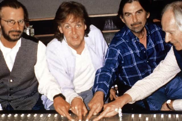 Handout file photo dated 20/11/95, of (from the left) Ringo Starr, Paul McCartney, George Harrison with producer George Martin during recording of a new Beatles song "Free As A Bird'.