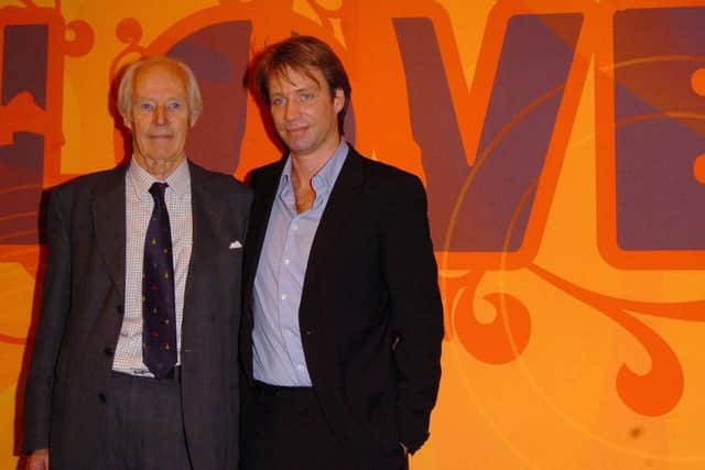 File photo dated 17/11/06 of Sir George Martin, with his son Giles, promoting the new Beatles 'Love Album' at Abbey Road Studios in London