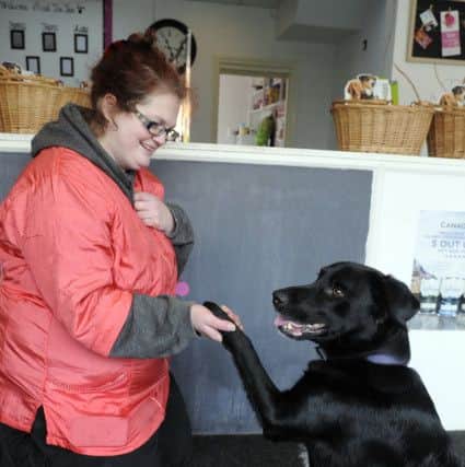 Helene Barton with assistance dog Adel