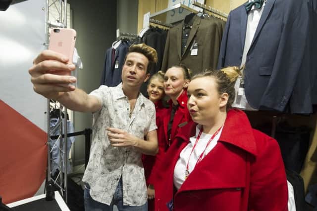 Nick Grimshaw with staff from Virgin Holidays.