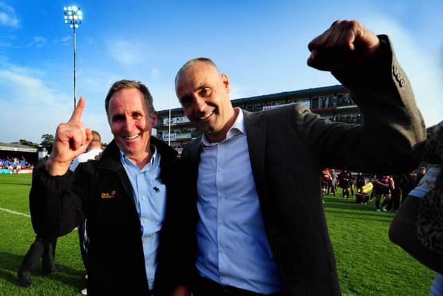 THE WAY WE WERE: Former Wakefield Wildcats coach Brian Smith, left, with owner and chairman, Michael Carter, after winning the Million Pound Game against Bradford Bulls last year.