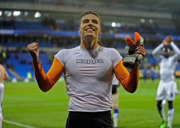Marco Silvestri celebrates his clean sheet in front of the travelling Leeds fans.
 (Picture: Bruce Rollinson)