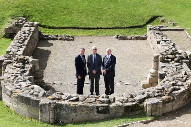 Work starts on Â£3.5m restoration scheme at Pontefract Castle. Coun Les Shaw, Wakefield Council's cabinet member for culture, leisure and sport, Coun Clive Tennent and Charles Aneley chairman of William Anelay Ltd, York