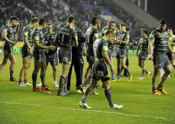 Rob Burrow and his Leeds Rhinos team-mates show their frustration at the final hooter.