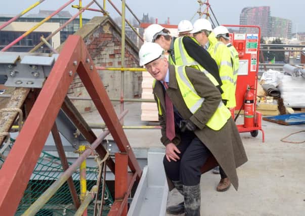 Leeds Central MP  Hilary Benn looking at the building work on the  roof of the new UTC in Leeds which is due to open in September. PIC: Gary Longbottom