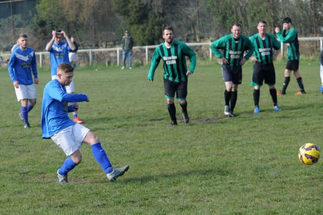 Heavy Woollen League action between Rose of York and Six Lane Ends. PIC: Steve Riding
