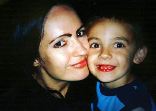 Levi Ringer, six, with his mother Vicky.