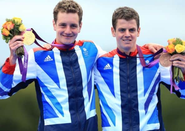 Alistair and Jonny Brownlee celebrate their gold and bronze medals at London 2012.