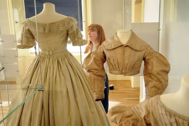 Natalie Raw, pictured with period dresses.
Picture by Simon Hulme