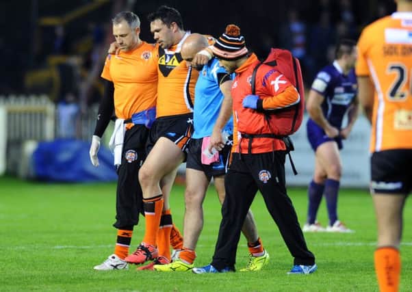 BAD LUCK: Castleford's Frankie Mariano is helped off the field against Huddersfield Giants in May last year.
Picture: Jonathan Gawthorpe.