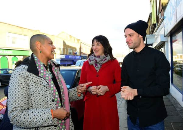 MP Rachel Reeves and councillor Alison Lowe, pictured on Armley Town Street in 2015, discussing how to tackle street drinking issues with local businessman Steven Etherington. Picture Scott Merrylees.