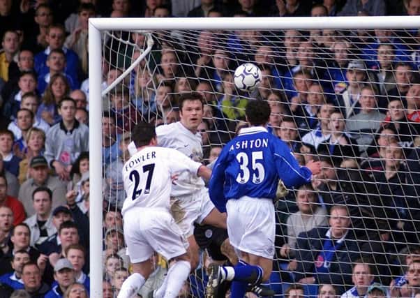 Robbie Fowler heads in Leeds United's second goal against Leicester City at Filbert Street in 2002.