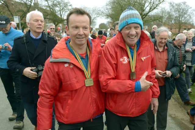 Paul Hudson and Harry Gration on their three-legged walk.