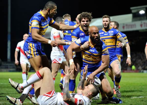 Jamie Jones-Buchanan celebrates scoring the Rhinos opening try on his 300th Super League appearance..  Picture: Bruce Rollinson