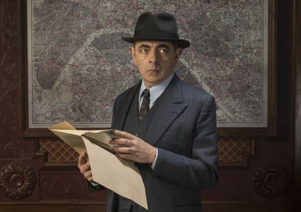 TOWNING IT DOWN: Rowan Atkinson is known as a comic actor, but plays it straight in his new role as Maigret in a TV adaptation of the detective novels.