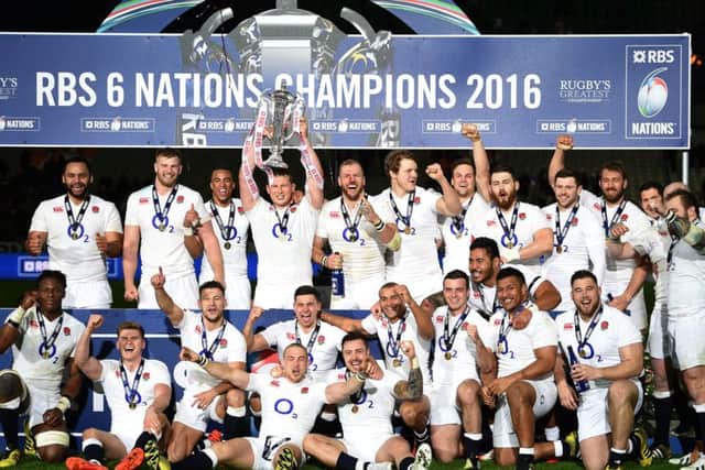 England's Dylan Hartley lifts the RBS 6 Nations trophy