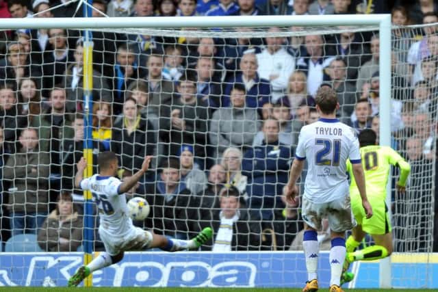 Huddersfield Town's  Karim Matmour scores against Leeds United on Saturday.