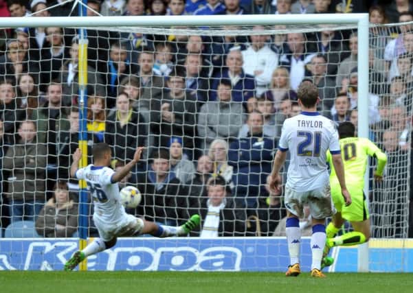 Huddersfield Town's  Karim Matmour scores against Leeds United on Saturday.