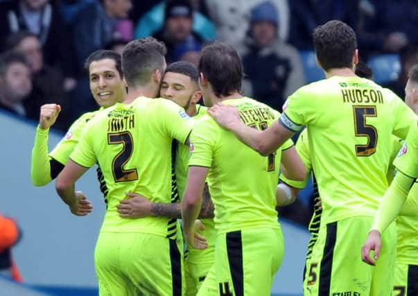 Huddersfield's Karim Matmour, left, celebrates his goal against Leeds United.