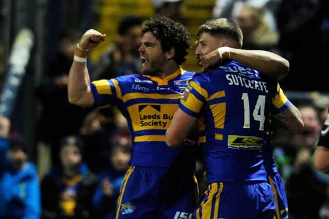 Liam Sutcliffe celebrates scoring against St Helens with Beau Falloon.