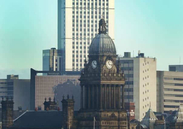10 January 2013......      Leeds Town Hall,  and Sky Plaza, the tallest building in the City in the city centre skyline.