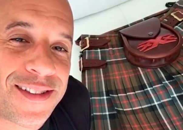 Hollywood actor Vin Diesel with his weathered Sinclair Hunting tartan kilt gifted to him from co-star Rory McCann after he found out about the stars Scottish heritage. See Centre Press story CPVIN; Hollywood action star Vin Diesel has got in touch with his Scottish heritage after he was gifted a specially designed kilt. The actor, real name Mark Sinclair, was gifted the kilt by Scottish co-star Rory McCann. The pair are due to appear in next years xXx: The Return of Xander Cage. Rory, famous for his portrayal of Sandor Clegane in Game of Thrones, has built a friendship with Vin since they met on the set of the movie. When he discovered Vins real name, he called his friend Brian Halley who owns the Slanj kilt shop in Glasgow.