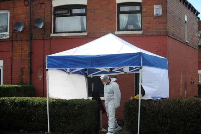 Police and Forensics at a house on East Park Street, East End Park, Leeds, where 3 bodies were found.. 27th March 2016. Picture by Simon Hulme