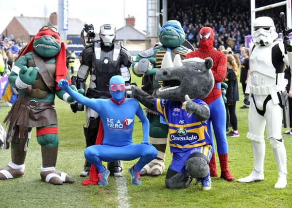 The Be A Hero mascot joins other mascots and superheroes at Headingley Carnegie Stadium. Picture by Bruce Rollinson.