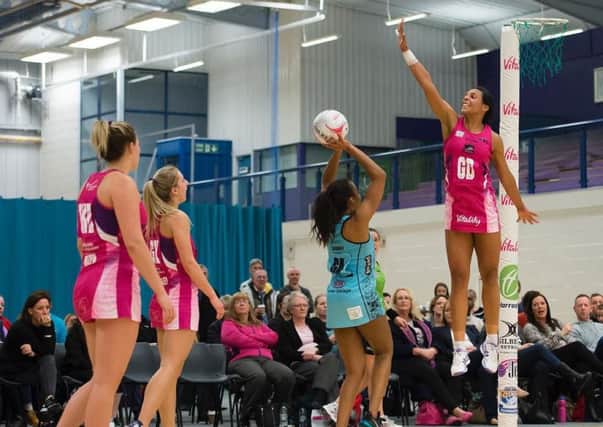 HIGH AIMS: Yorkshire Jets Stacey Francis attempts to make an attempt on goal difficult for her Surrey Storm opponent.